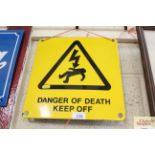 An enamel warning sign "Danger of Death Keep Off",
