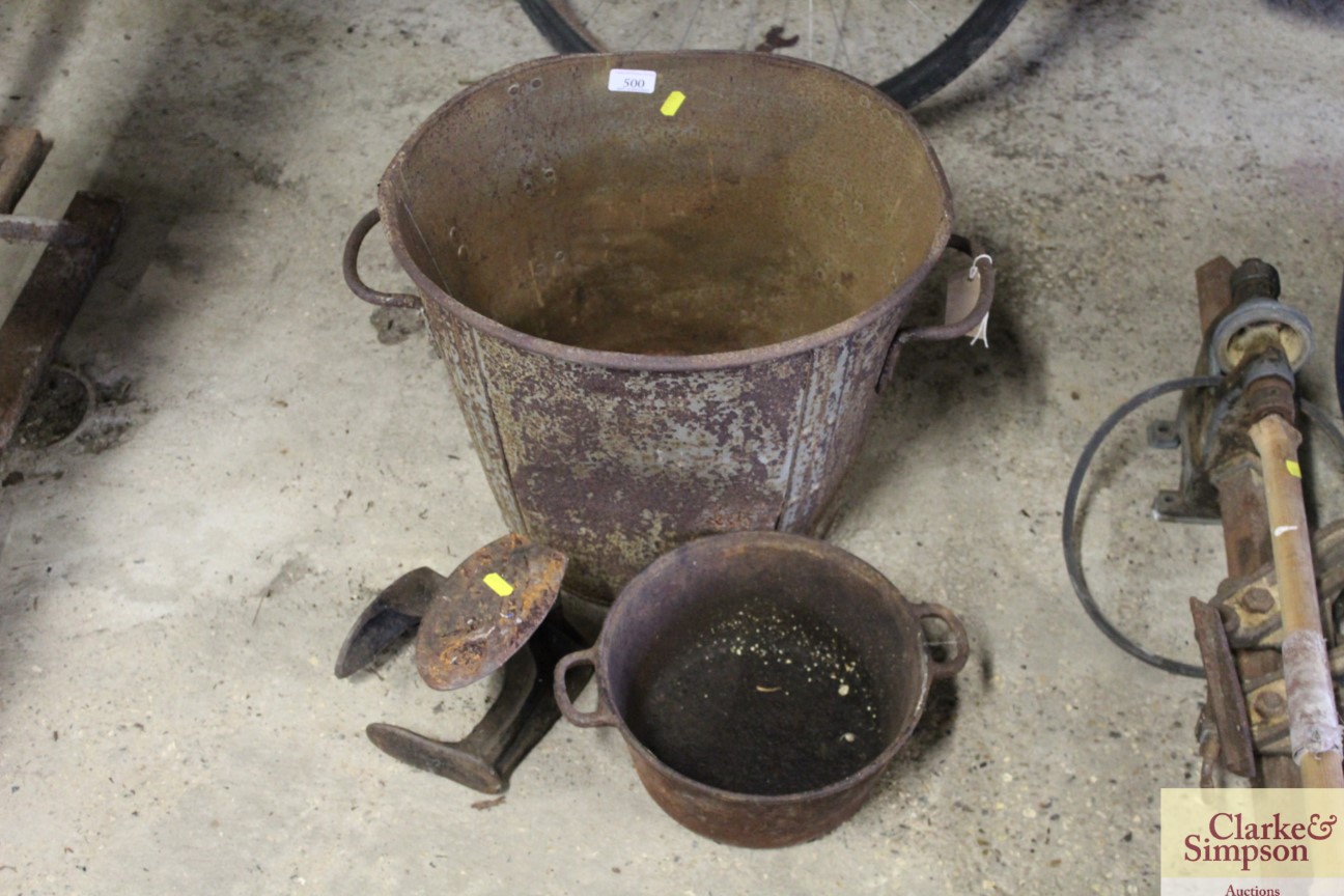 A cast iron bushel hod, a cast iron boiling pan a