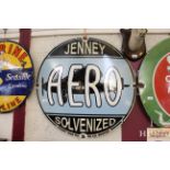 A circular enamel advertising sign for "Jenney Aer