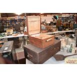 A vintage pine trunk and a wine carrying box