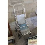 A vintage folding pushchair