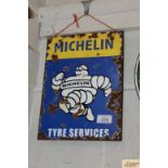 A "Michelin Tyre Services" enamel advertising sign