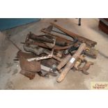 A quantity of saws, stirrup pump, axe heads, other