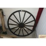 A vintage carriage wheel approx. 42" dia.