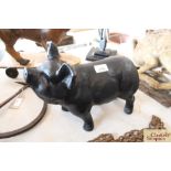 A composition humorous model of a black pig