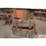 Two vintage wooden ammunition crates and a wine bo