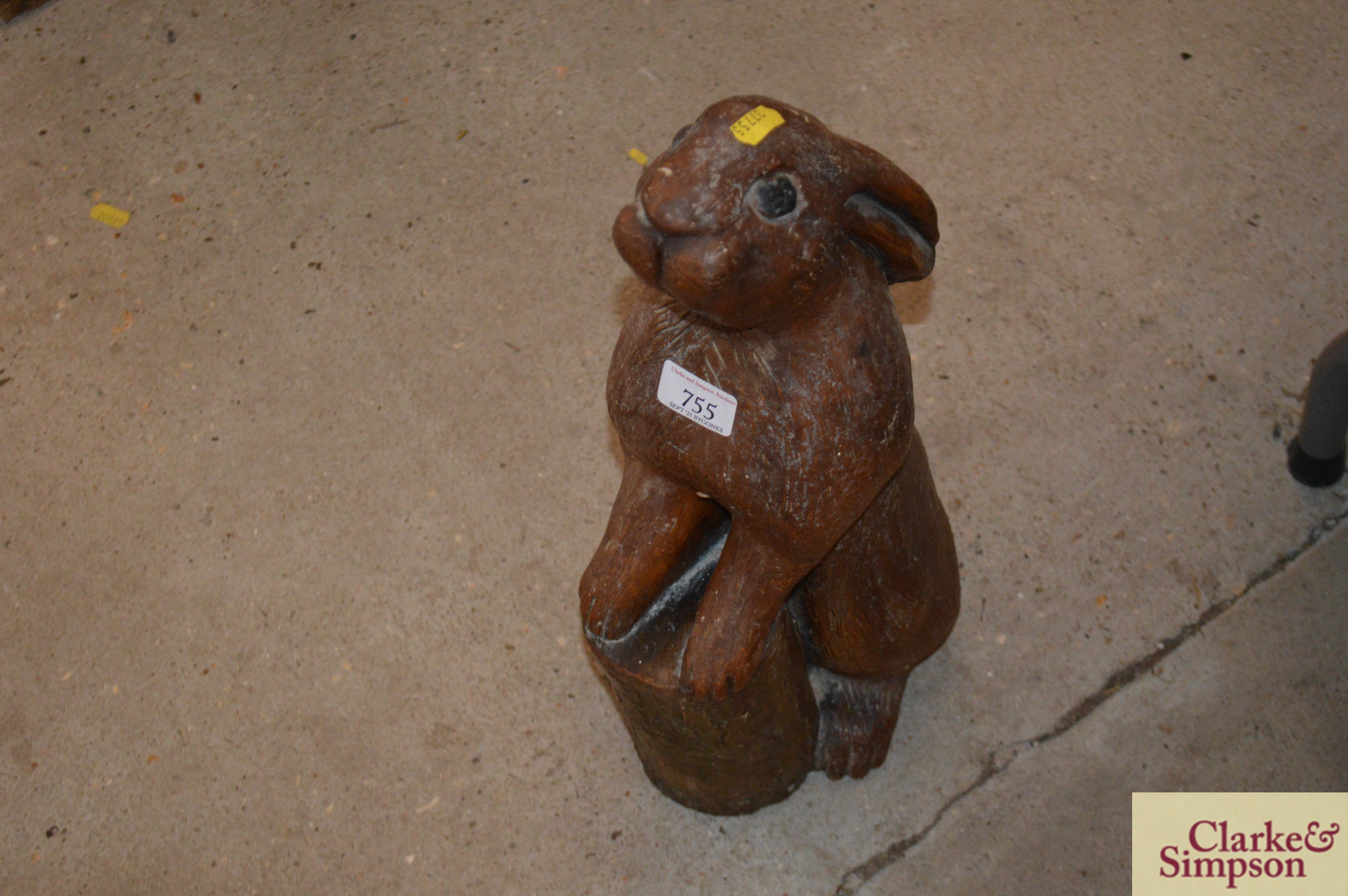 A cast brown figure of a rabbit