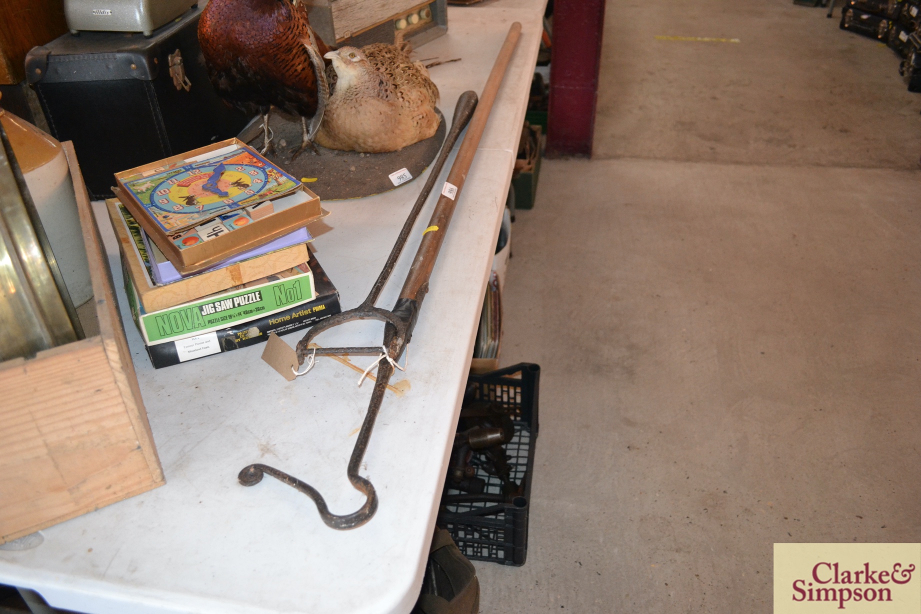 A shepherds crook and a dibber