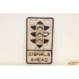 A cast metal road sign "Signals Ahead", 21" x 12"