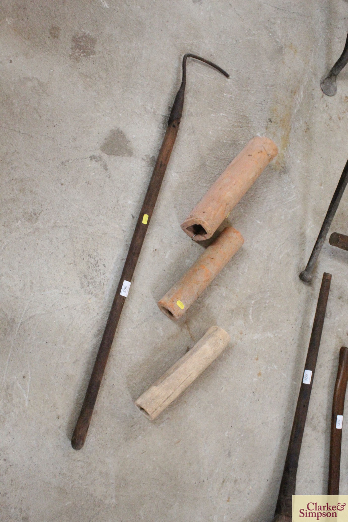 A drainage laying tool and three Roman and other