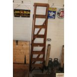 A vintage wooden "Hatherly Jones Patent" lattice step ladder