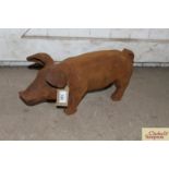 A cast iron model pig