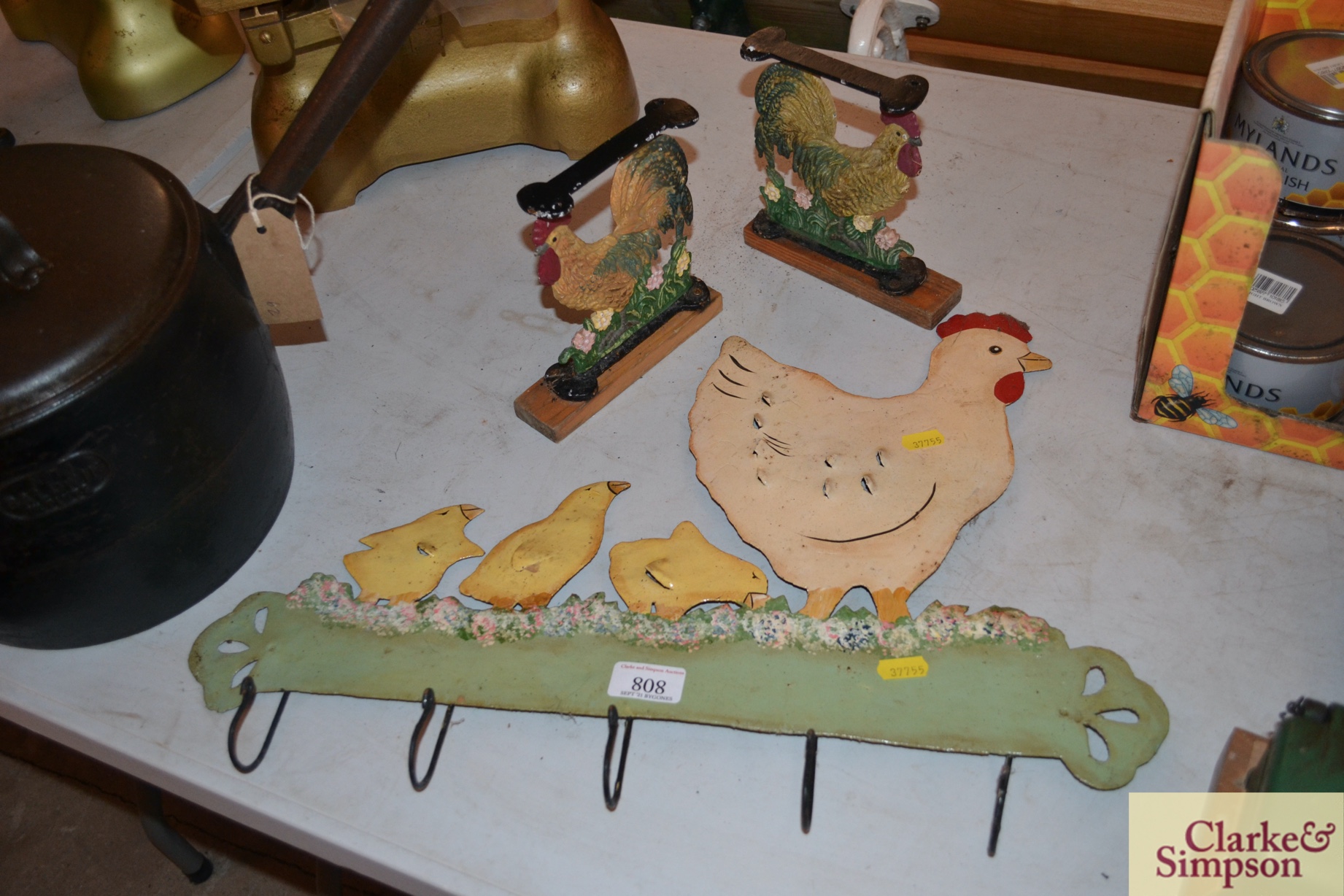 A metalware hen and chicks decorated coat hook an