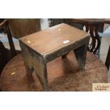 A 19th Century rectangular topped elm stool