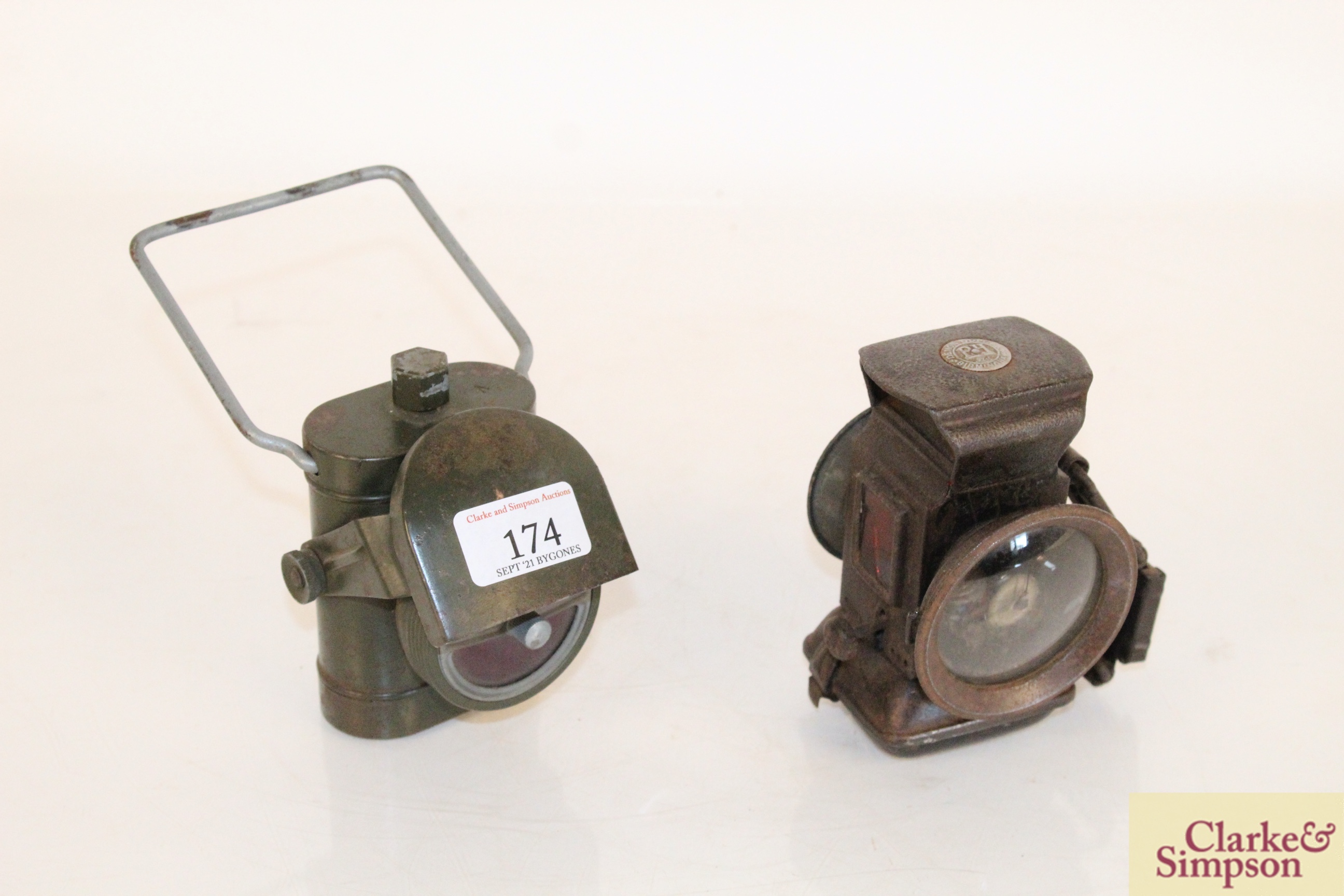 Two vintage cycle lamps