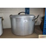 An aluminium boiling pan with Bakelite handle and