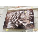 A tin sign advertising "Jalopy Races, Balboa Stadi
