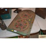 A Lindstom's Gold Star tin plate Bagatelle board