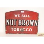 A double sided enamel sign for "Nut Brown Tobacco"