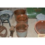 Three graduated galvanised and iron pails with swi