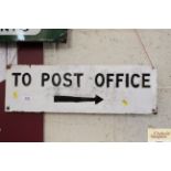 A metal sign "Post Office", approx. 8" x 22½"