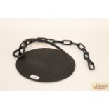 A cast iron swing handled skillet with chain