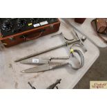 A pair of vintage thatcher's shears and a garden