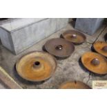 Three large circular cast iron troughs, one AF