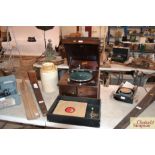 A Dulcetto table model gramophone and ten 78rpm re