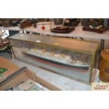 A plastic 30" model of RMS Titanic, mounted in a g