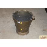 A brass coal bucket