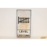 A cast metal road sign "Level Crossing", 24" x 11½