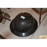 A WW2 wardens helmet