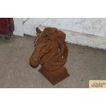 A cast iron horses head