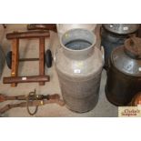 A milk churn ( no lid)