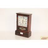 An American mantel clock with white painted Roman