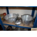 Two aluminium preserving pans and a whistling kettl