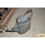 A large French watering can