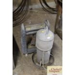 A vintage galvanised Valor oil greenhouse heater