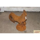 A rusty cast iron cockerel ornament