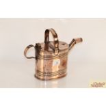 An antique copper Country House watering can
