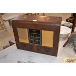 A Bush walnut cased vintage ACH radio - sold as co