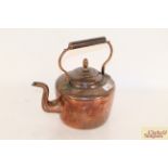 An antique copper kettle