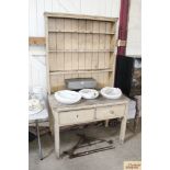 An antique painted pine dresser