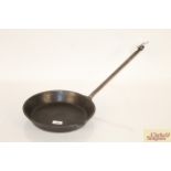 A heavy cast iron 9" Kenrick frying pan