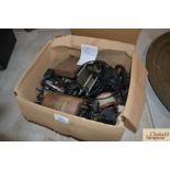 A box of miscellaneous vintage radio tuners and coi