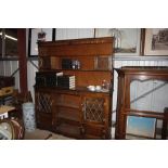 An oak and leaded glazed dresser