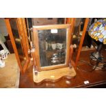 A Victorian mahogany swing frame toilet mirror