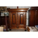 A Dutch antique carved oak cupboard fitted two drawers bel