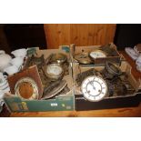 Three boxes of various clock parts